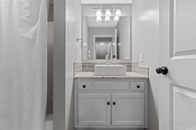 9 Westoak Cir, Little Rock, AR 72223 - full bathroom with decorative backsplash, vanity, a chandelier, and a shower with curtain
