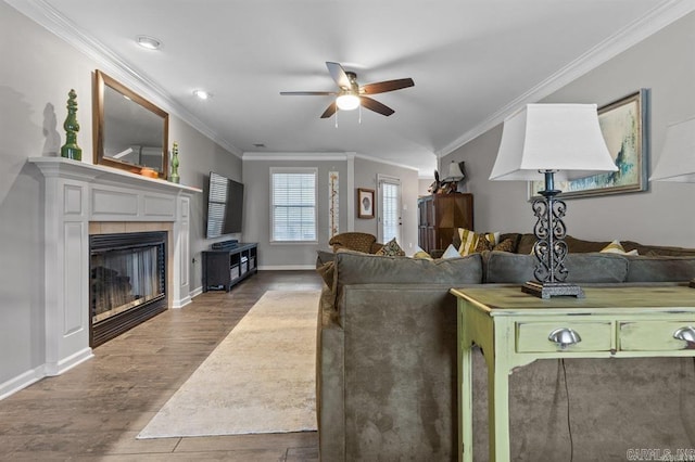 9 Westoak Cir, Little Rock, AR 72223 - living room with ceiling fan, dark wood finished floors, a fireplace, ornamental molding, and baseboards