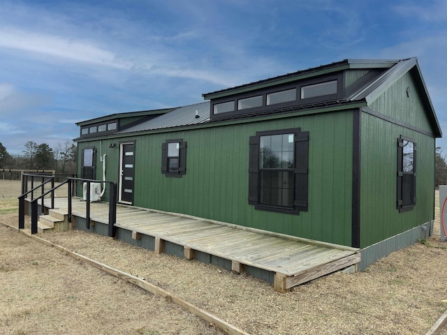 12017 Miller County 10, Fouke, AR 71837 - view of side of home featuring metal roof and a deck