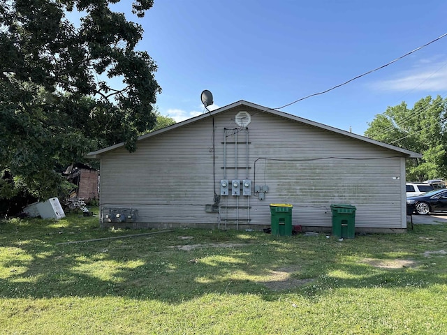 422 Mimosa Rd, North Little Rock, AR 72117 - view of side of home featuring a lawn