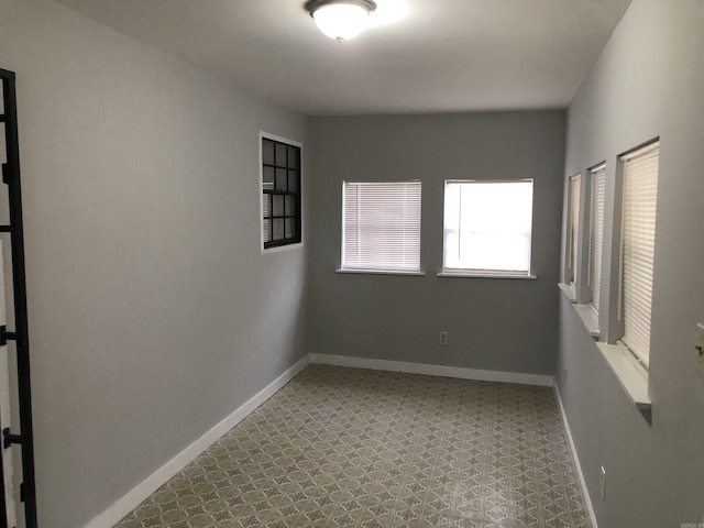 6 Bryan Keith Ct, Little Rock, AR 72206 - empty room with baseboards and tile patterned floors