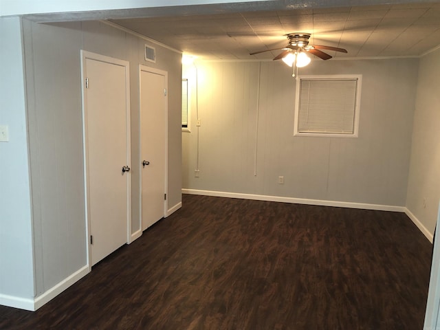 6 Bryan Keith Ct, Little Rock, AR 72206 - empty room featuring a ceiling fan, dark wood-type flooring, baseboards, and ornamental molding