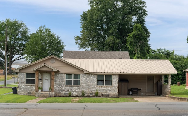 508 W Bell, Sheridan, AR 72150 - view of front of home featuring crawl space, a front yard, a carport, and brick siding