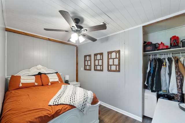 508 W Bell, Sheridan, AR 72150 - bedroom featuring dark wood finished floors, wood ceiling, a closet, a ceiling fan, and ornamental molding