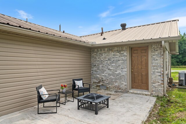 508 W Bell, Sheridan, AR 72150 - view of patio with a fire pit and central air condition unit