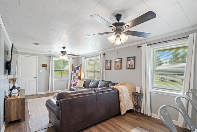 508 W Bell, Sheridan, AR 72150 - living room featuring ceiling fan, ornamental molding, dark wood finished floors, and baseboards