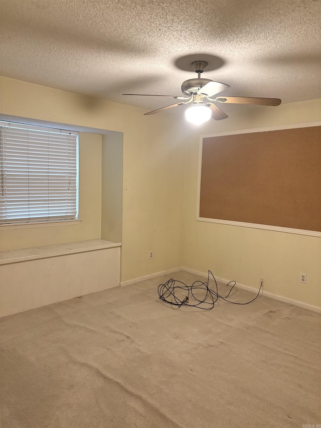 13 Page Cv, Maumelle, AR 72113 - carpeted spare room with ceiling fan and a textured ceiling