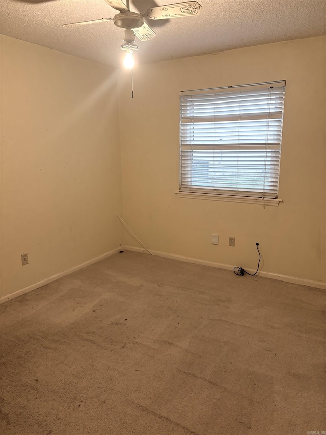 13 Page Cv, Maumelle, AR 72113 - empty room with ceiling fan, carpet flooring, baseboards, and a textured ceiling
