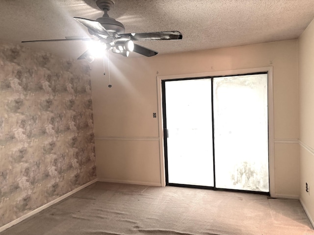 13 Page Cv, Maumelle, AR 72113 - spare room featuring a ceiling fan, baseboards, a textured ceiling, and carpet