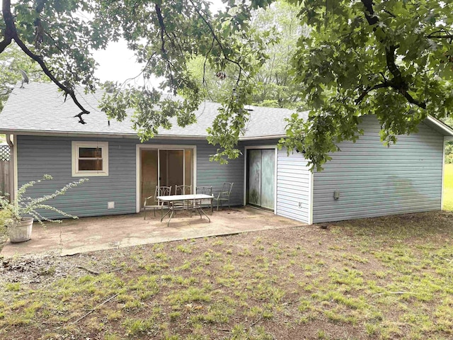 13 Page Cv, Maumelle, AR 72113 - back of property featuring a patio and roof with shingles