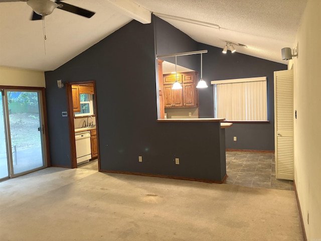 13 Page Cv, Maumelle, AR 72113 - unfurnished living room with carpet flooring, ceiling fan, a sink, baseboards, and rail lighting