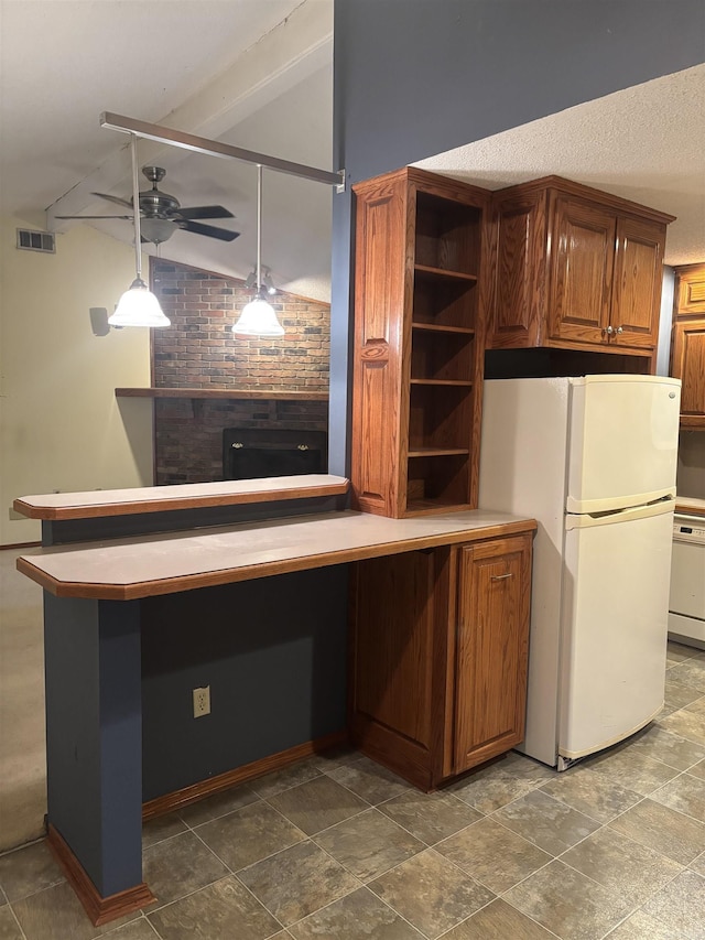 13 Page Cv, Maumelle, AR 72113 - kitchen with white appliances, ceiling fan, open shelves, brown cabinets, and pendant lighting