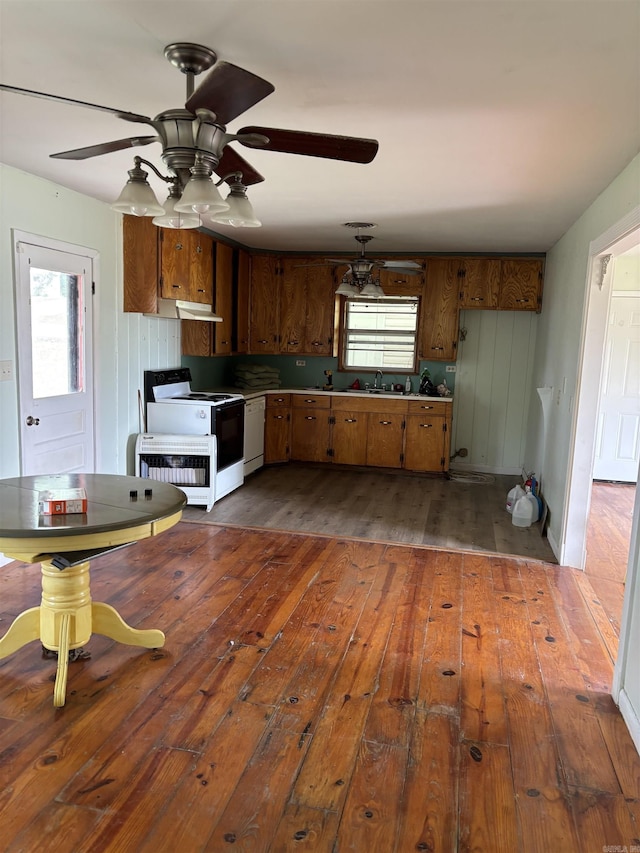 211 Murray, Dierks, AR 71833 - kitchen with white appliances, dark wood-style flooring, a ceiling fan, a sink, and brown cabinets