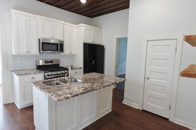 1365 Mitchell St, Conway, AR 72034 - kitchen featuring stainless steel appliances, white cabinets, a sink, tasteful backsplash, and wood ceiling