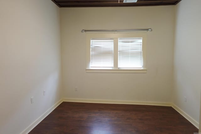 1365 Mitchell St, Conway, AR 72034 - empty room featuring dark wood-style floors and baseboards