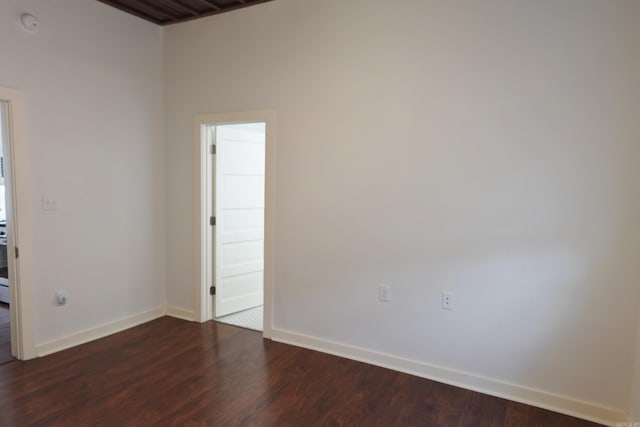 1365 Mitchell St, Conway, AR 72034 - spare room with dark wood-style flooring and baseboards