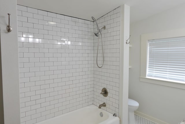 1365 Mitchell St, Conway, AR 72034 - bathroom featuring toilet,  shower combination, tile patterned floors, and baseboards