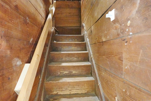 1365 Mitchell St, Conway, AR 72034 - stairway with wooden walls