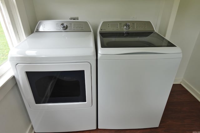 1365 Mitchell St, Conway, AR 72034 - laundry room with independent washer and dryer, dark wood-style floors, and baseboards