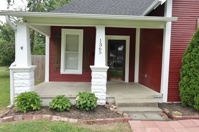 1365 Mitchell St, Conway, AR 72034 - doorway to property featuring roof with shingles and a porch
