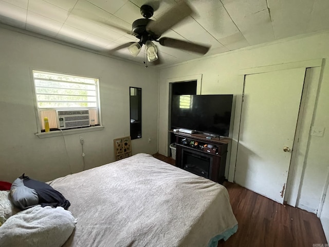 210 Gann St, Mena, AR 71953 - bedroom featuring wood finished floors and ceiling fan