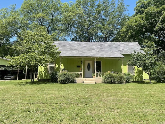 210 Gann St, Mena, AR 71953 - view of front of property featuring a porch, a front yard, and board and batten siding