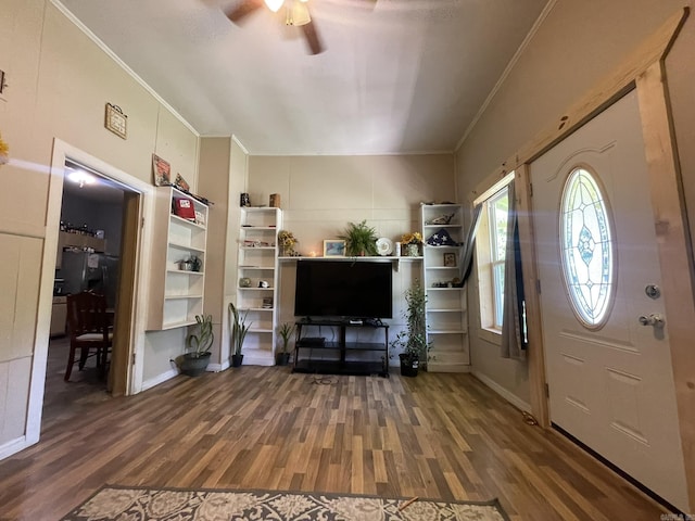 210 Gann St, Mena, AR 71953 - foyer entrance with wood finished floors, ornamental molding, and a ceiling fan