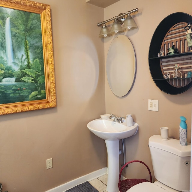 1401 S Schiller, Little Rock, AR 72202 - bathroom with tile patterned flooring, toilet, and baseboards