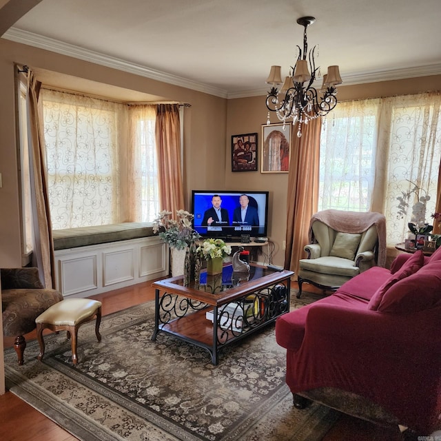 1401 S Schiller, Little Rock, AR 72202 - living room with healthy amount of natural light, a chandelier, crown molding, and wood finished floors