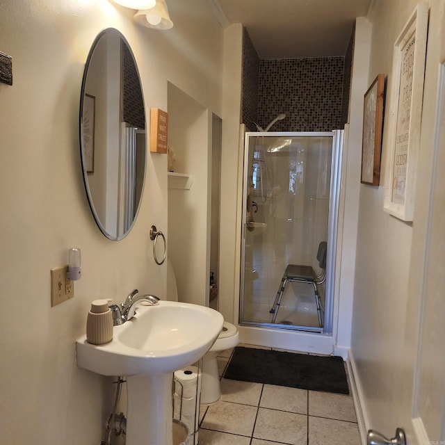 1401 S Schiller, Little Rock, AR 72202 - bathroom featuring tile patterned floors and a shower stall