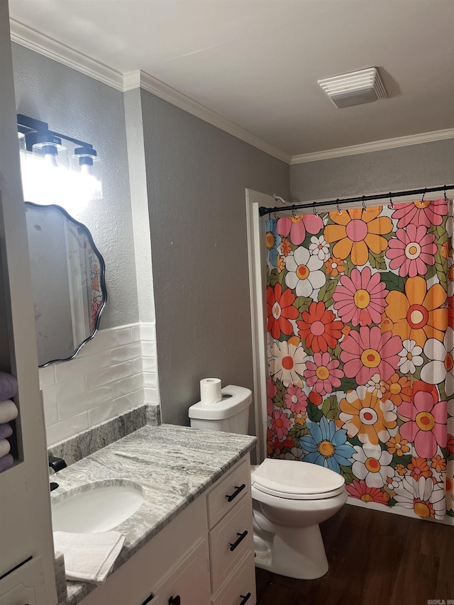 2715 Deer Xing, El Dorado, AR 71730 - bathroom featuring vanity, wood finished floors, toilet, ornamental molding, and a shower with shower curtain