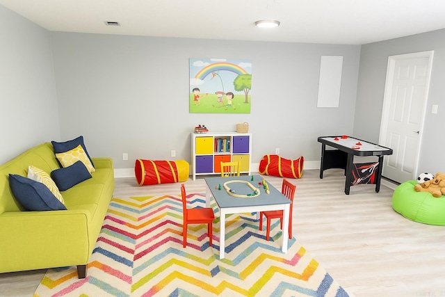 2715 Deer Xing, El Dorado, AR 71730 - playroom featuring wood finished floors and baseboards