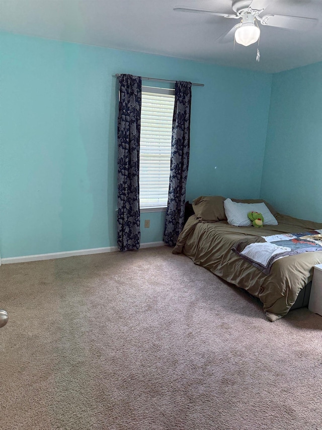 2 Flourite Ct, Little Rock, AR 72212 - bedroom with carpet flooring, baseboards, and ceiling fan