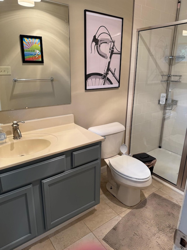 2 Flourite Ct, Little Rock, AR 72212 - bathroom with vanity, toilet, a shower stall, and tile patterned flooring