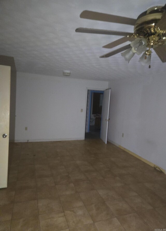 1851 W Clay, Piggott, AR 72454 - empty room with a ceiling fan