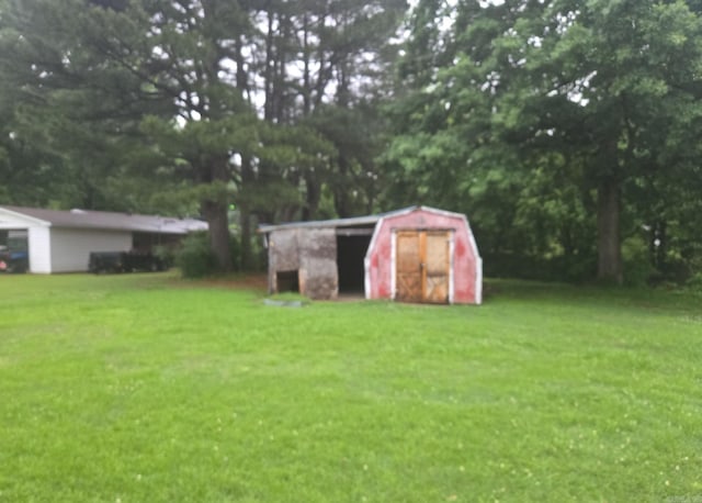 1851 W Clay, Piggott, AR 72454 - view of grassy yard with view of scattered trees