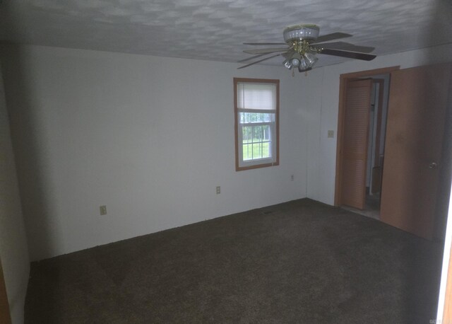 1851 W Clay, Piggott, AR 72454 - carpeted spare room with ceiling fan and a textured ceiling