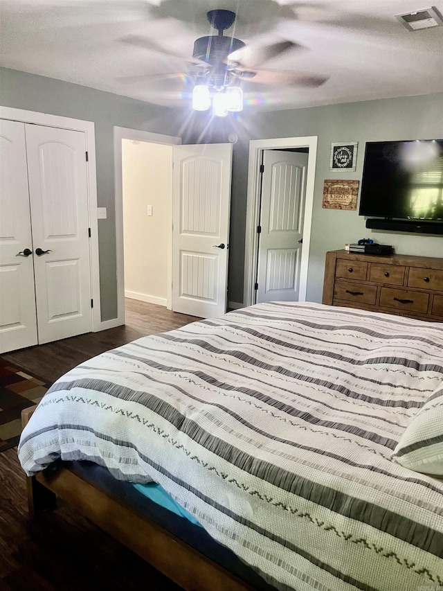 88 Cobblestone Rd, Plumerville, AR 72127 - bedroom featuring wood finished floors, baseboards, a closet, and a ceiling fan