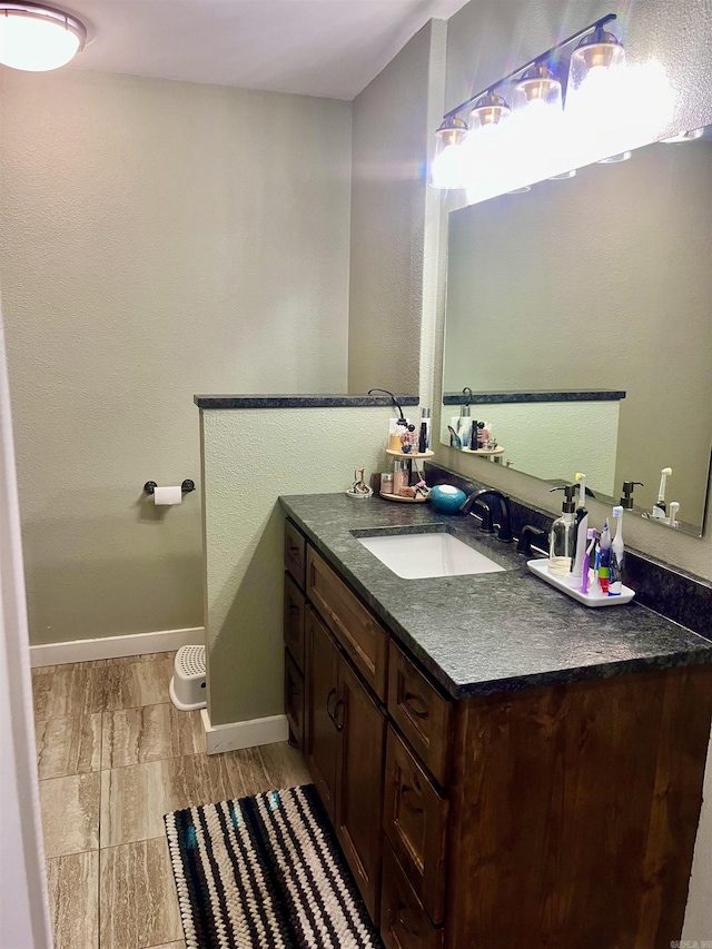 88 Cobblestone Rd, Plumerville, AR 72127 - bathroom featuring vanity and baseboards