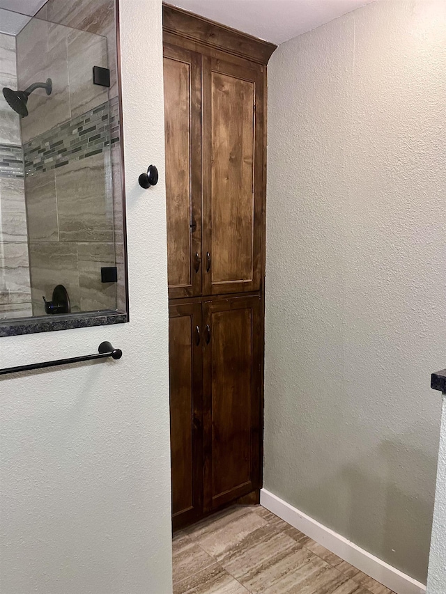 88 Cobblestone Rd, Plumerville, AR 72127 - hallway featuring light wood-style floors, baseboards, and a textured wall