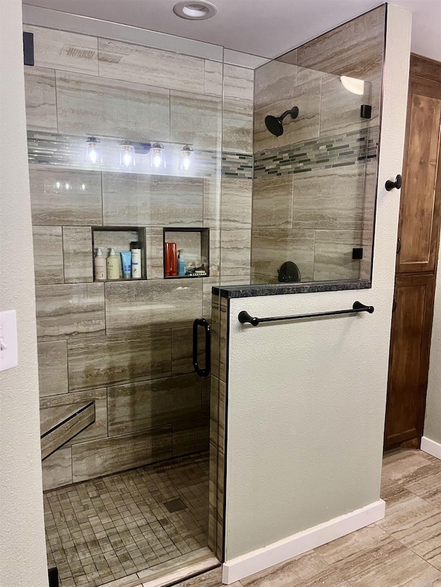88 Cobblestone Rd, Plumerville, AR 72127 - full bath with a shower stall, wood finished floors, and baseboards