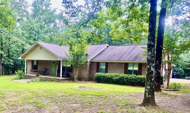88 Cobblestone Rd, Plumerville, AR 72127 - ranch-style home featuring brick siding, a front yard, and covered porch