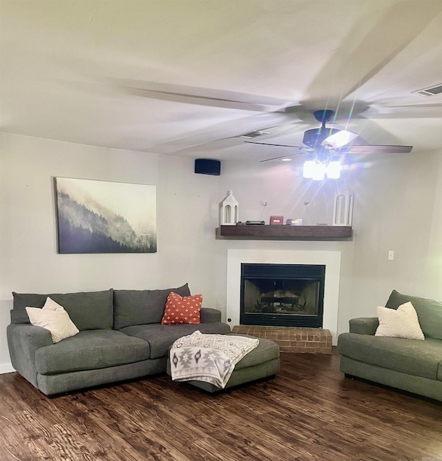 88 Cobblestone Rd, Plumerville, AR 72127 - living area featuring wood finished floors, ceiling fan, and a fireplace