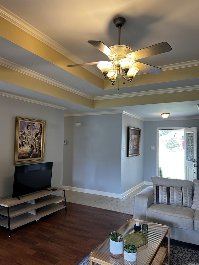 11 Willow Cv, Cabot, AR 72023 - living area featuring a ceiling fan, wood finished floors, baseboards, and crown molding