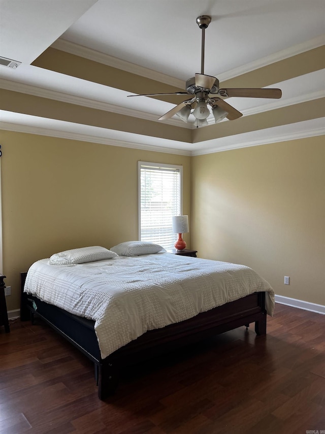 11 Willow Cv, Cabot, AR 72023 - bedroom featuring a raised ceiling, baseboards, wood finished floors, ornamental molding, and ceiling fan