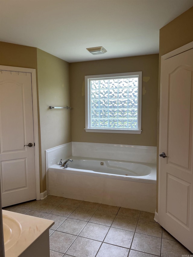 11 Willow Cv, Cabot, AR 72023 - full bath with a garden tub, vanity, and tile patterned floors