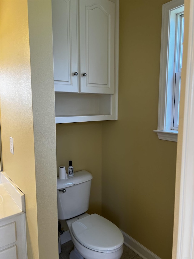 11 Willow Cv, Cabot, AR 72023 - bathroom featuring toilet, vanity, and baseboards