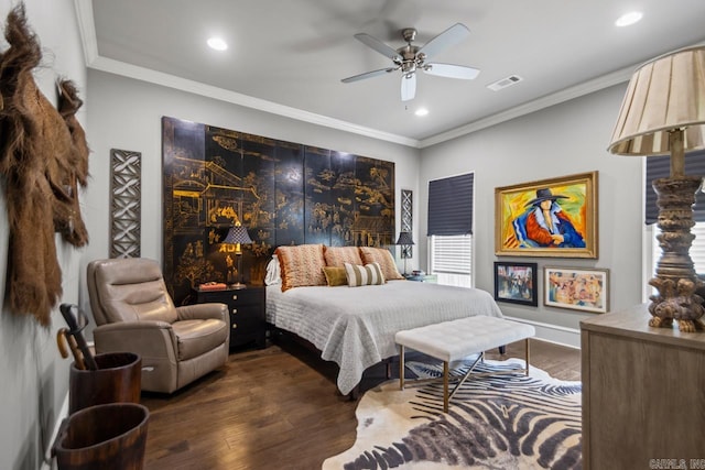 bedroom with dark wood finished floors, recessed lighting, ornamental molding, ceiling fan, and baseboards