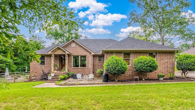 14320 Bradley Rd, Maumelle, AR 72113 - view of front of home with roof with shingles and brick siding