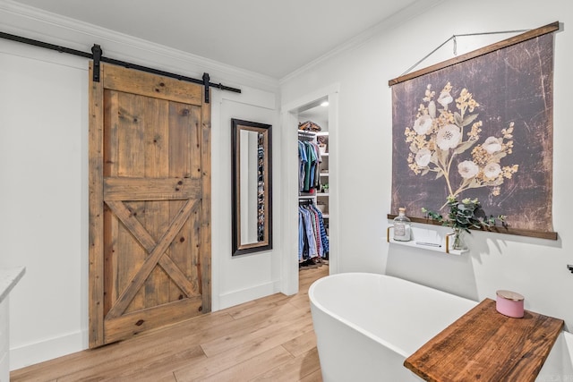 14320 Bradley Rd, Maumelle, AR 72113 - office space featuring a barn door, wood finished floors, and ornamental molding